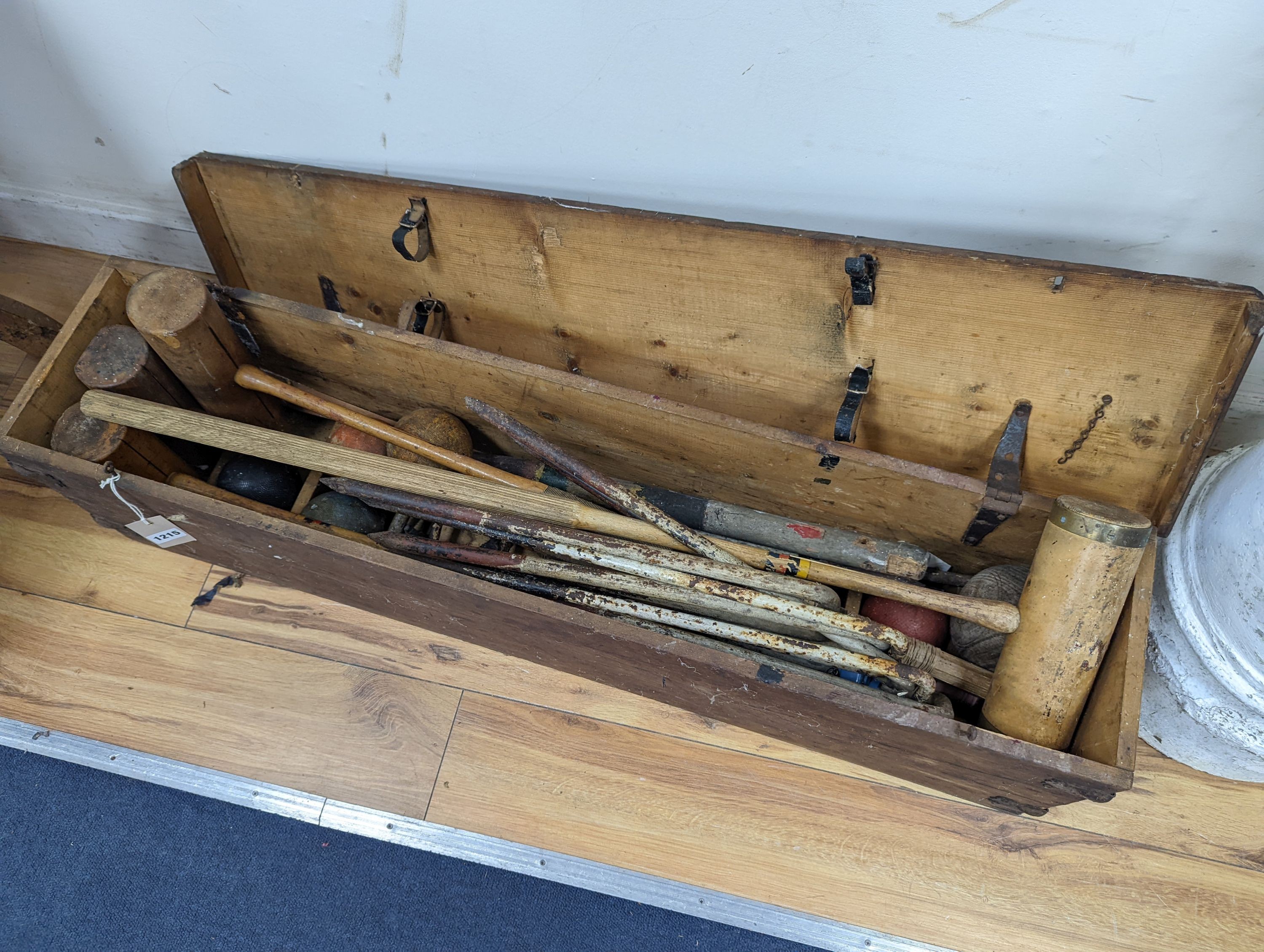 A vintage croquet set in original box